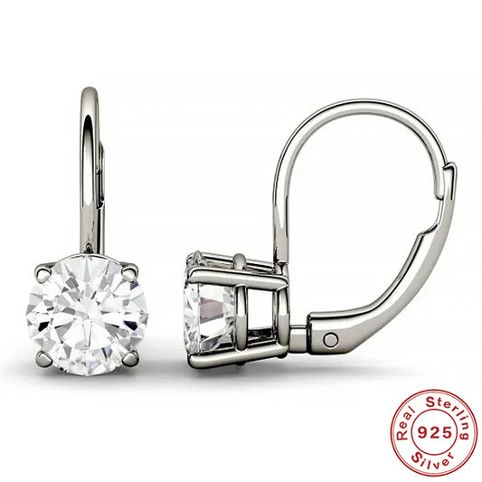 "The Stellar Solitaire: D-Class Moissanite Studs in Sterling Silver"